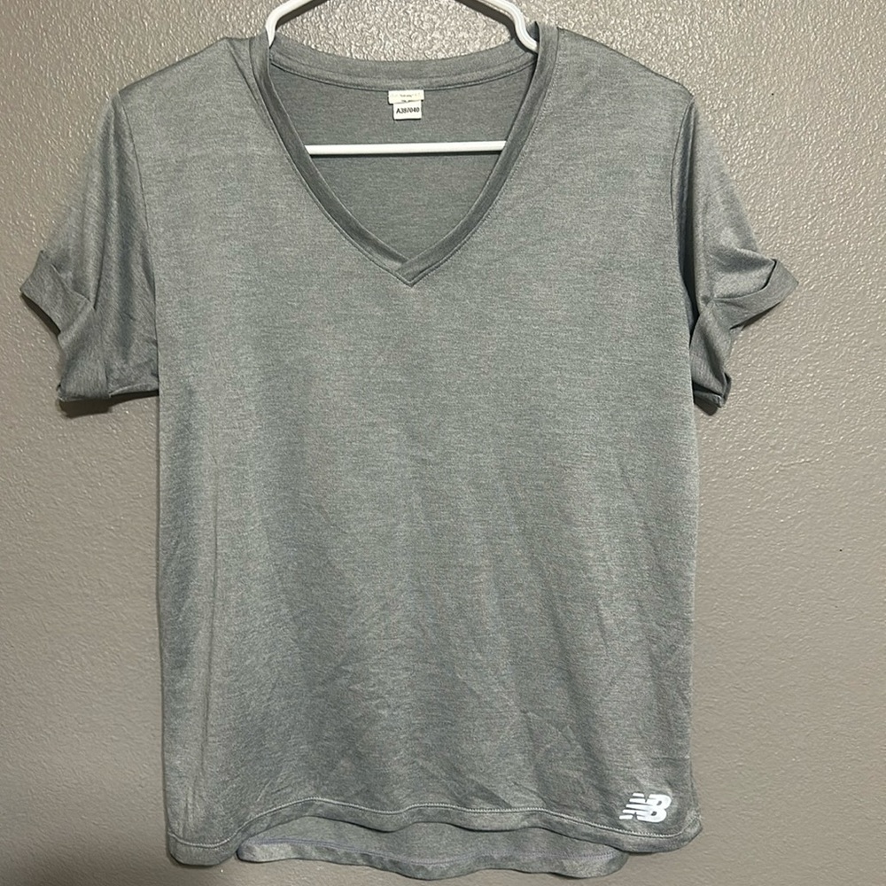New Balance size M/L V-Neck Women’s Athletic Shirt